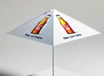 White event umbrella with beer bottle print and logos, set on a stable white frame.