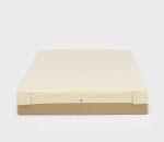 Custom-made beige trailer tarpaulin, shown on a cardboard model in a neutral setting.