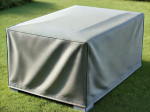 Grey custom-made protective cover covering garden furniture on the lawn.