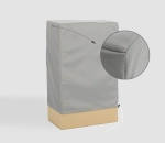 Grey custom-made protective cover on a tall object with an enlarged detail of the durable material and weave.