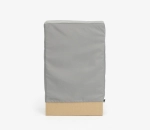 Custom grey protective cover fitted on a rectangular cuboid object on a white background.
