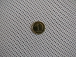 Exemplu de textură a pânzei de umbrar albă 3,2x2,5m cu țesătura vizibilă și o monedă de 1 grosz.
