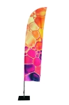 Custom-made advertising sail in an irregular shape, with colourful graphics resembling artistic air bubbles.