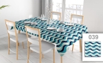 Promotional tablecloth with blue wave print on a dining table with white chairs and tableware. Model 039.